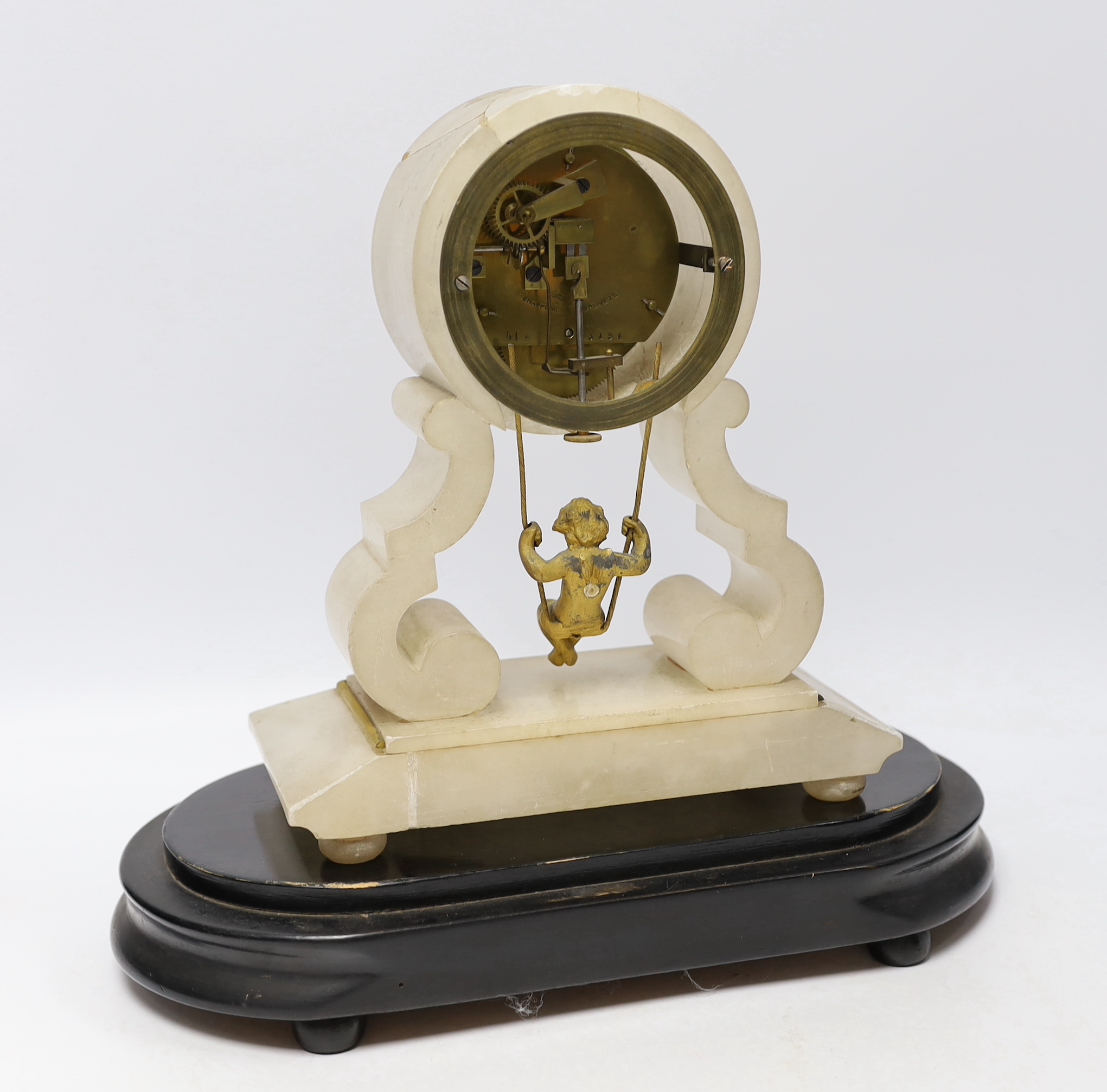 A late 19th century French alabaster and gilt metal mantel clock, with ebonised stand and glass dome, total height 32.5 cm